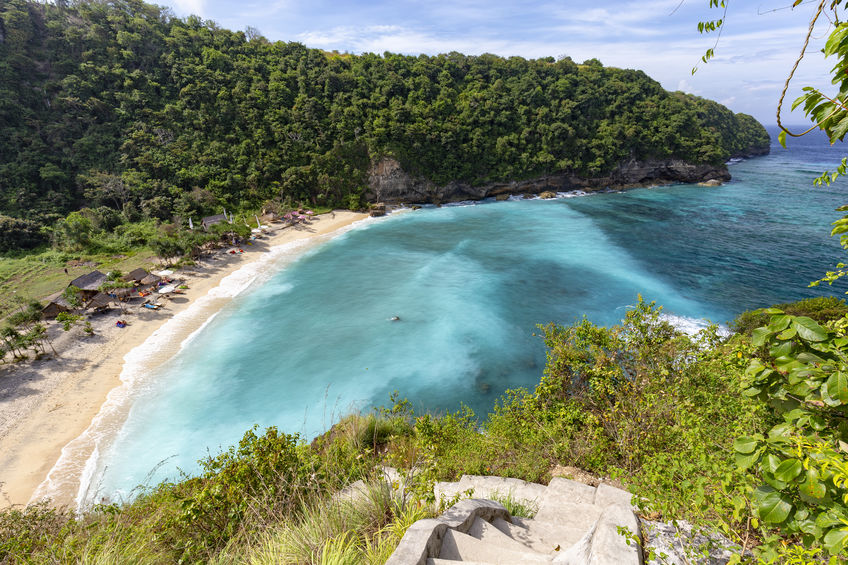 Stairs leading to beautiful Atuh Beach in Nusa Penida near Bali.