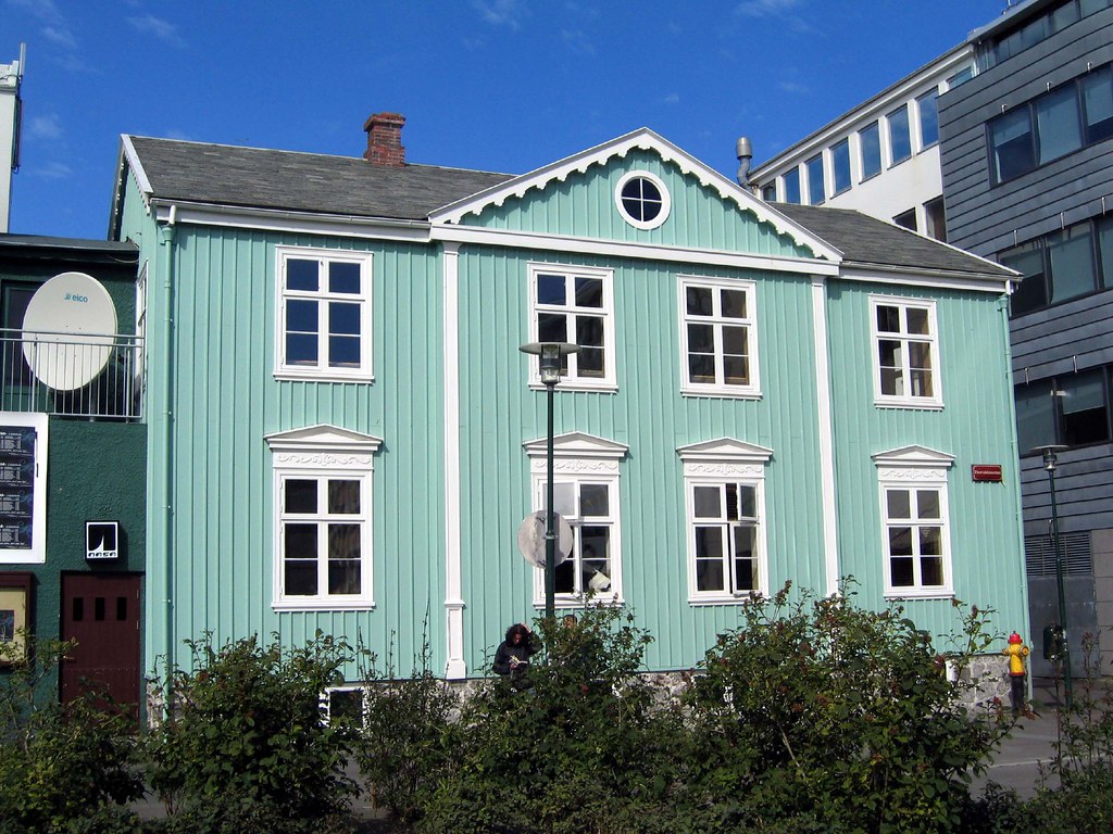 Surrounded by cafes, Austurvöllur Square is a popular spot for sunbathing in the city 