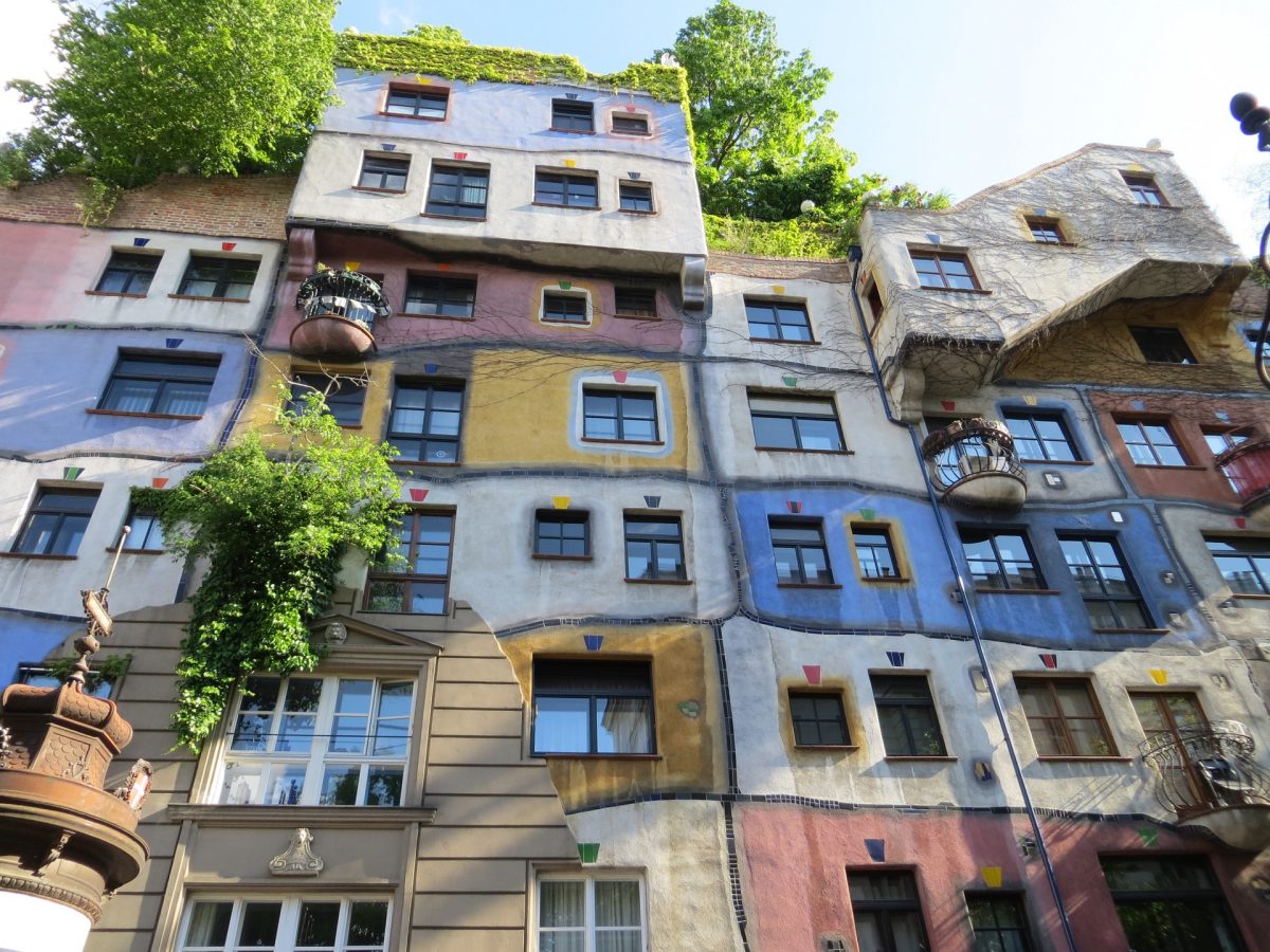 Hundertwasser House brings a funky modern freestyle vibe to the imperial streets of Vienna with trees and vibrant colours complementing this giant artwork