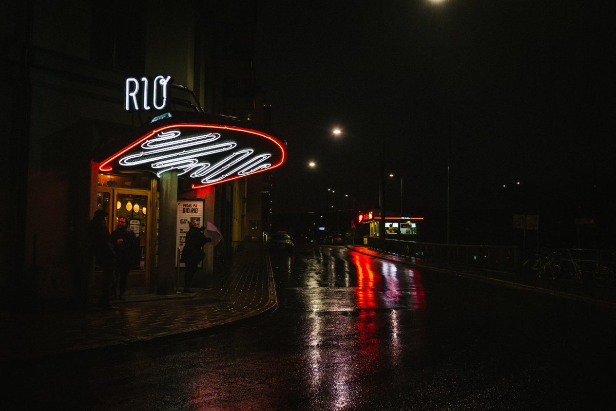 Bio Rio, gorgeous night time shot of wet streets, traffic and the Bio Rio Cinema night lights Bio Rio, gorgeous night time shot of wet streets, traffic and the Bio Rio Cinema night lights