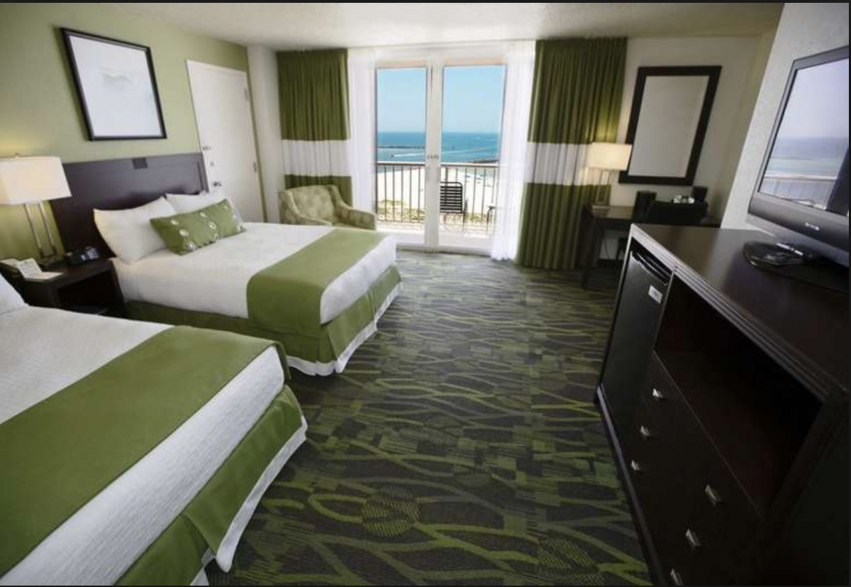 Dressed and decorated in soothing tones of green and white, the rooms at the Perdido Beach Resort seems to resemble spas rather than hotel rooms