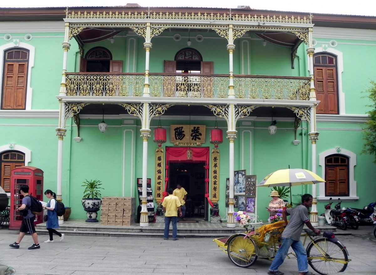 Ground view of Pinang Peranakan Mansion in Penang with its awesome green walls and oriental decor