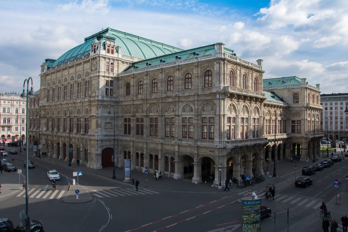 The facade of Vienna State Opera is beautifully decorated in Renaissance-style with a grandiose entrance featuring five iconic statues