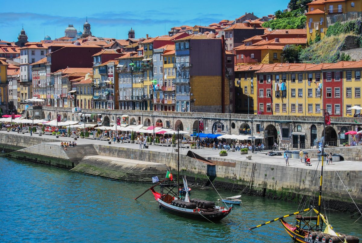 First-person view of the Cais da Ribeira, the waterfront of Porto’s UNESCO historical site