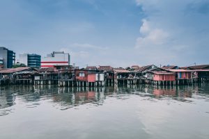 Beautiful first person view of Penang’s kelong houses with the city in the background