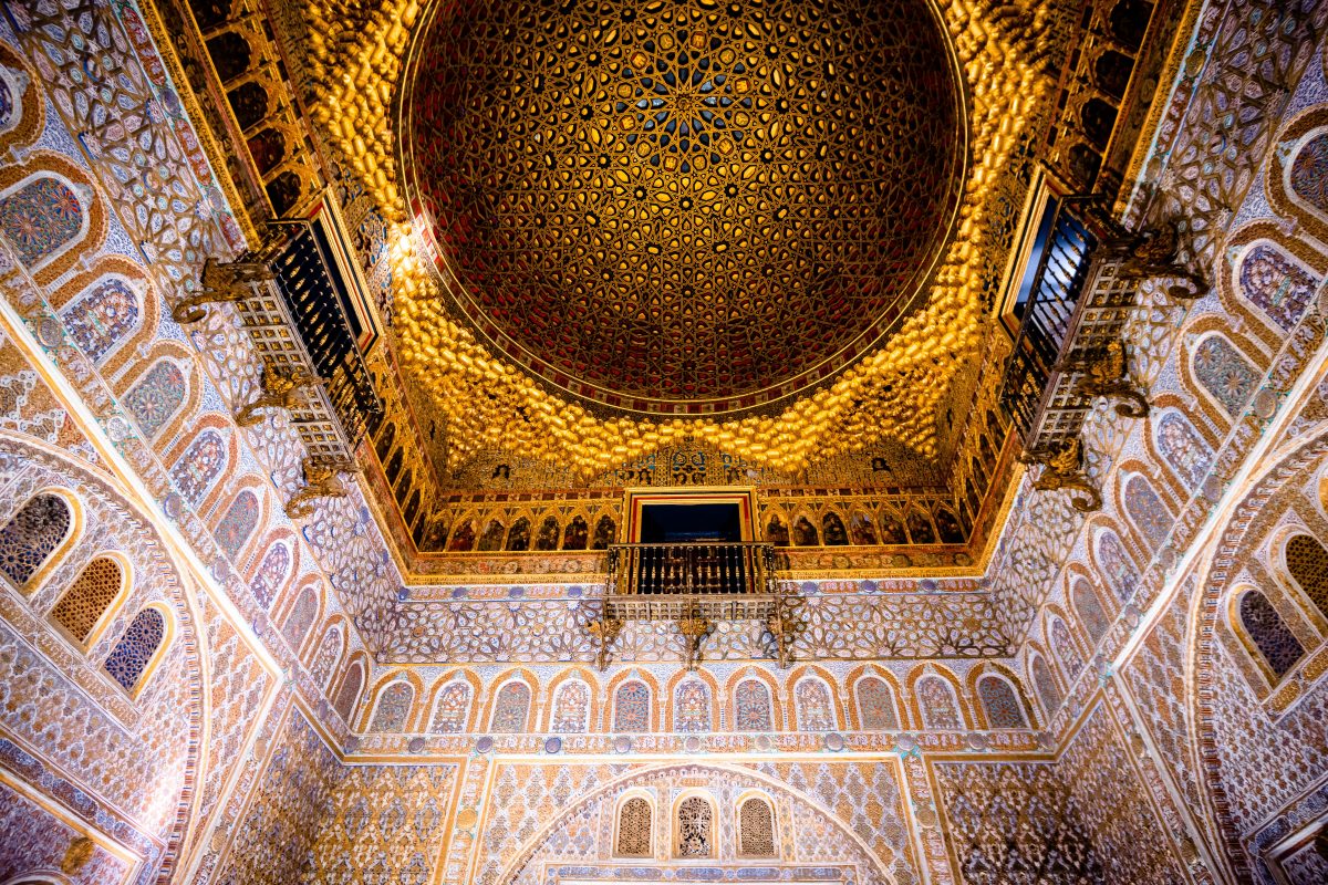 Interior golden architecture of Royal Alcázar, Seville