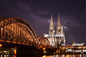 Night view of Cologne over city bridge