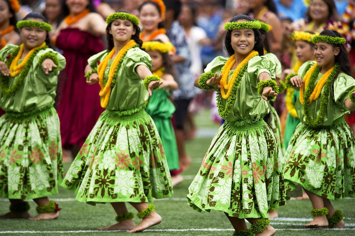 group of hawaiian women dancing hula