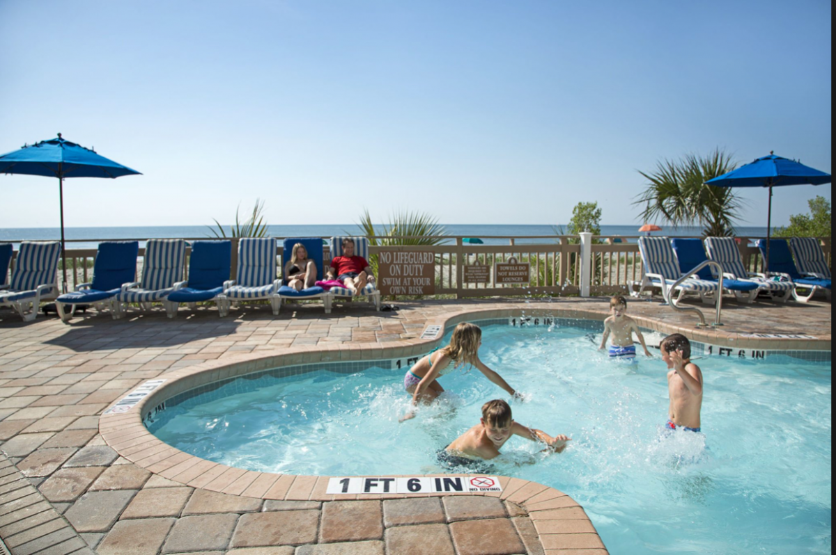 Boasting a large oceanfront pool and outdoor jacuzzis, there is no shortage of pool amenities at Coral Beach Resort