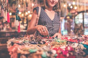 Woman browsing jewelry market