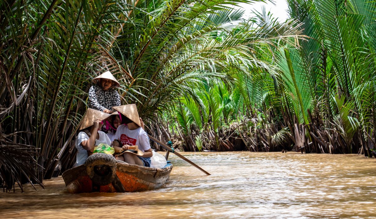 What To Expect From A Trip To Mekong Delta Tourists on a cruise along Mekong Delta Photo by Tomas Malik on Unsplash 1200x700 - What To Expect From A Trip To Mekong Delta