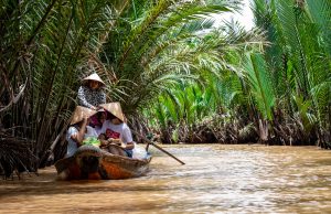 Tourists on a cruise along Mekong Delta Photo by Tomas Malik on Unsplash 300x194 - Swamp Eels And Noodles: An Auspicious Start To A New Year