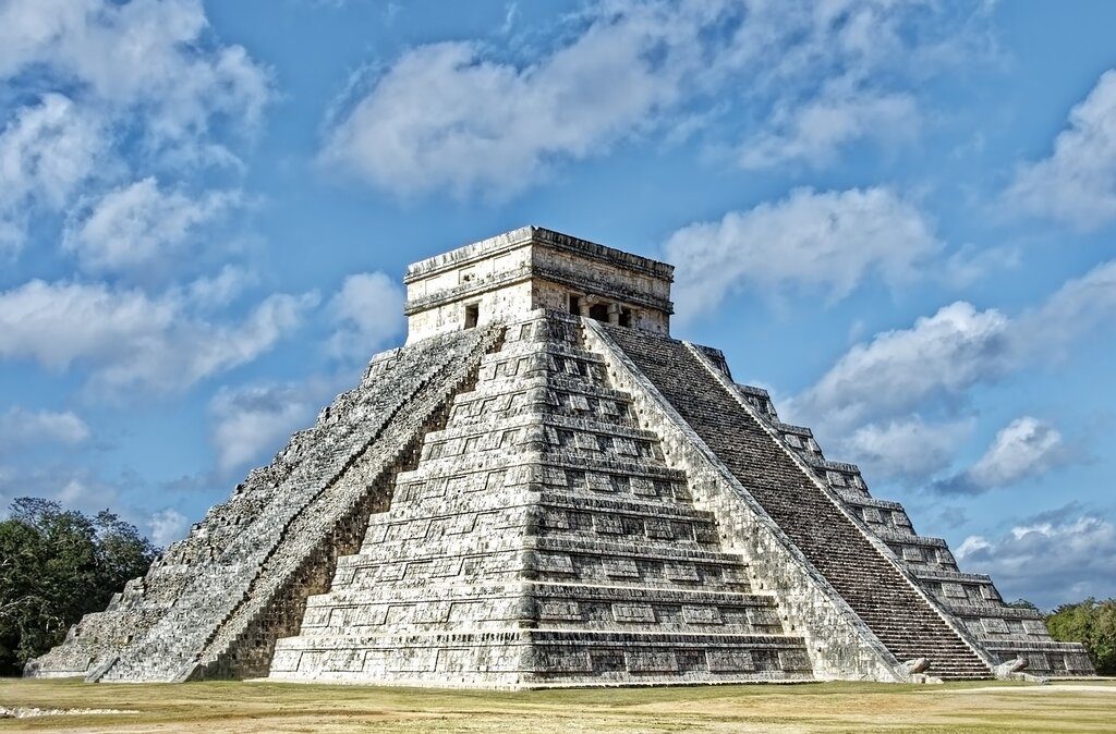 View of El Castillo at Chichen Itza ruins on a sunny day