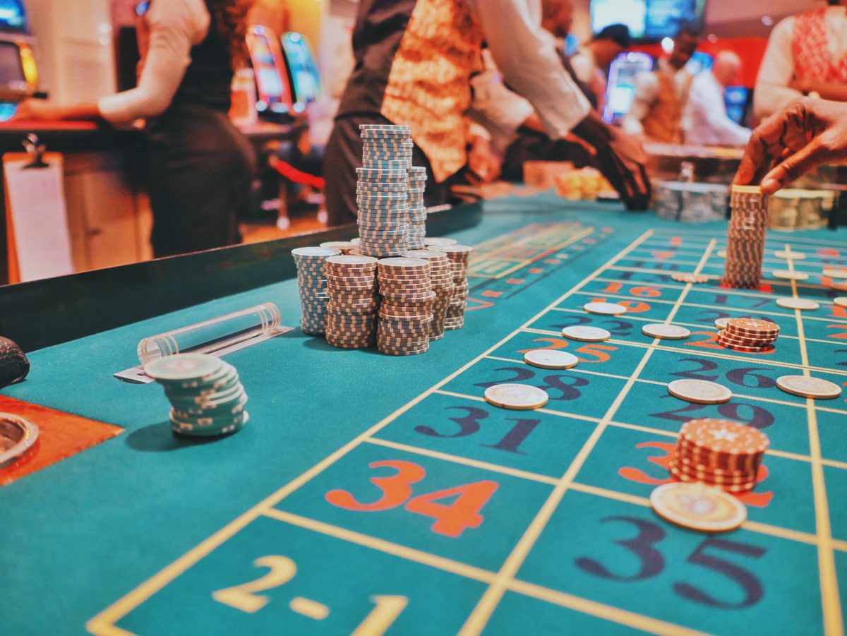 Gambling table with people playing