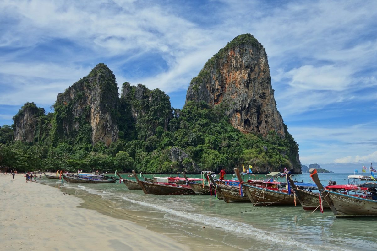 Boats perched on the shoreline of Railay Beach, Thailand