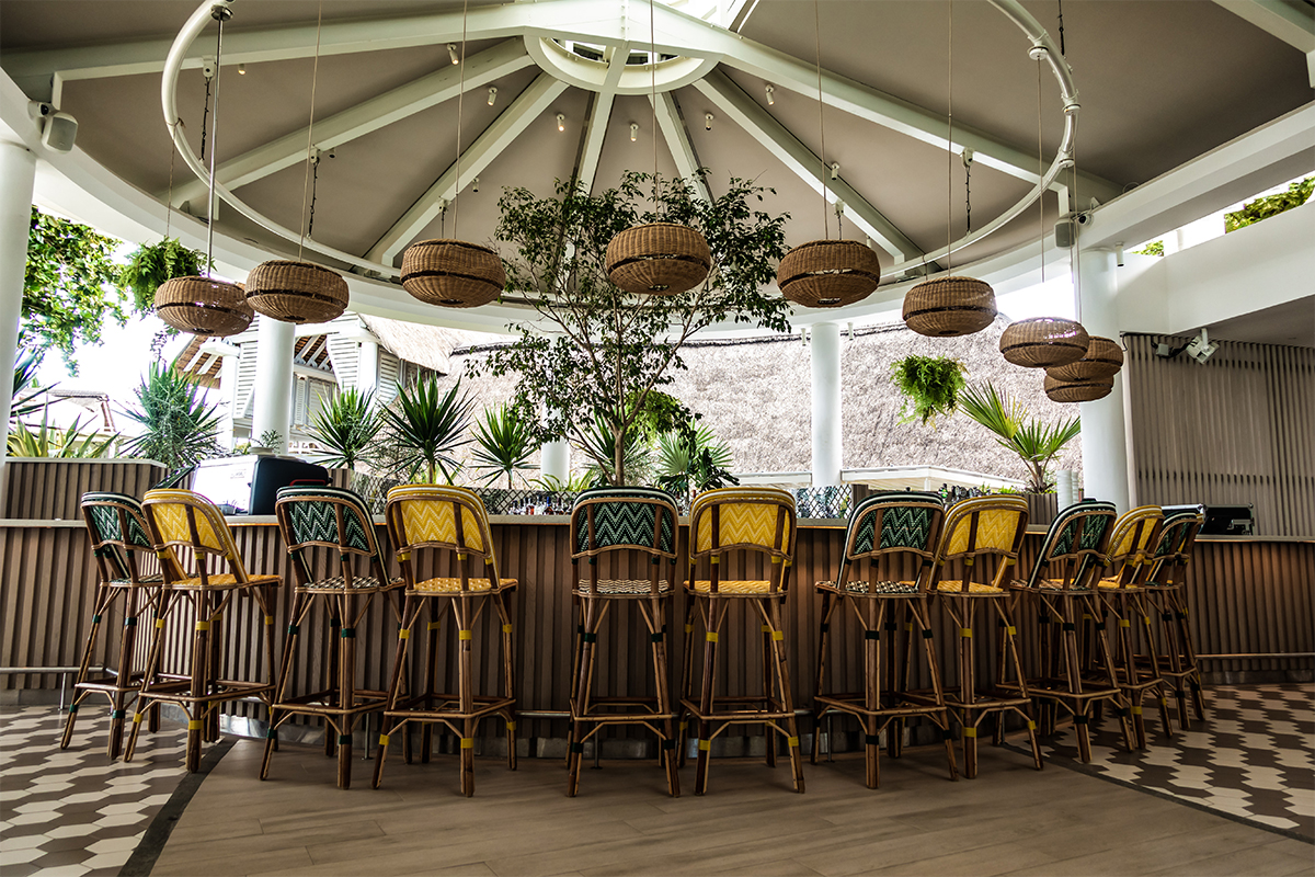 Wooden chairs around a round table 