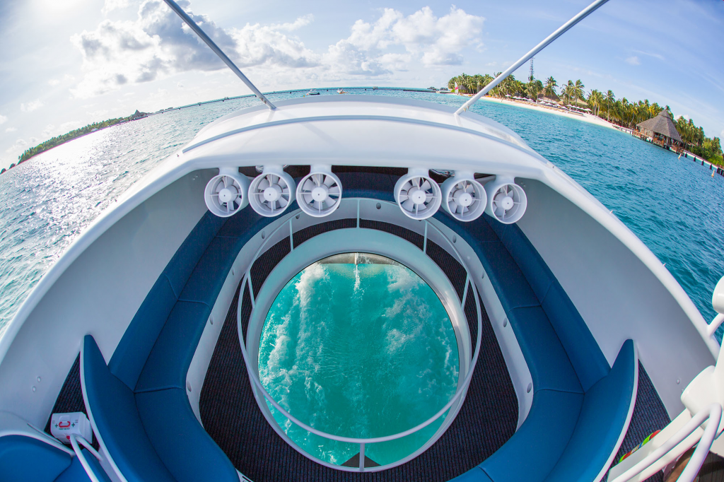 Have A Clasy Glass Bottom Boat Trip Around The Maldives Islands.