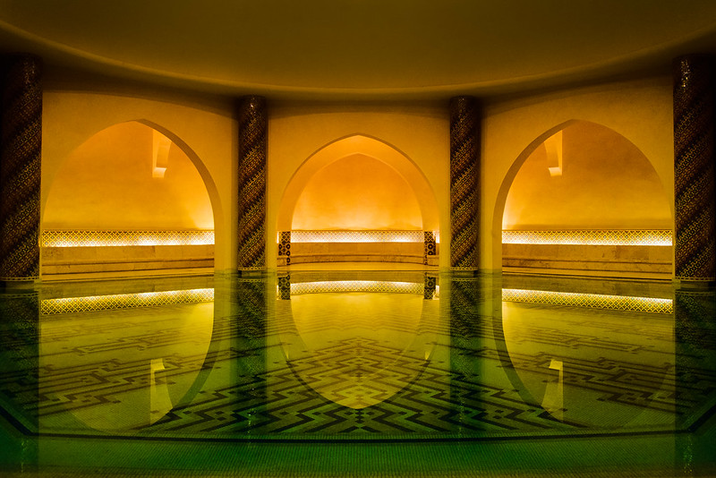 Dimly lit hammam pool at Hassan II Mosque