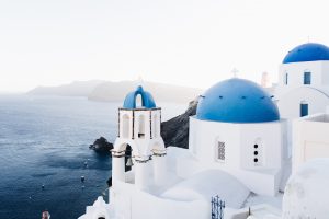 beautiful contrast of the blue and white painted structures in Santorini