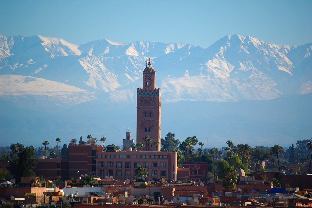 View of Marrakech with a backdrop of mountain range