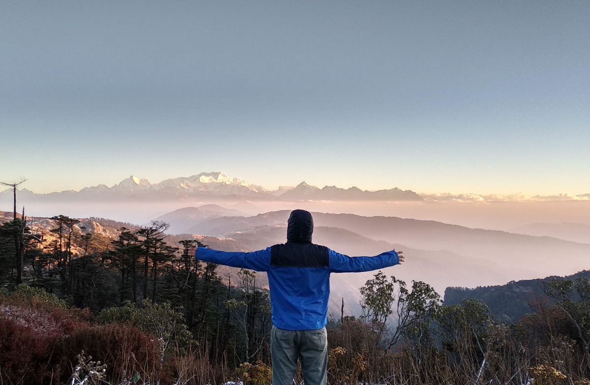 darjeeling A man standing on mountain during daytime