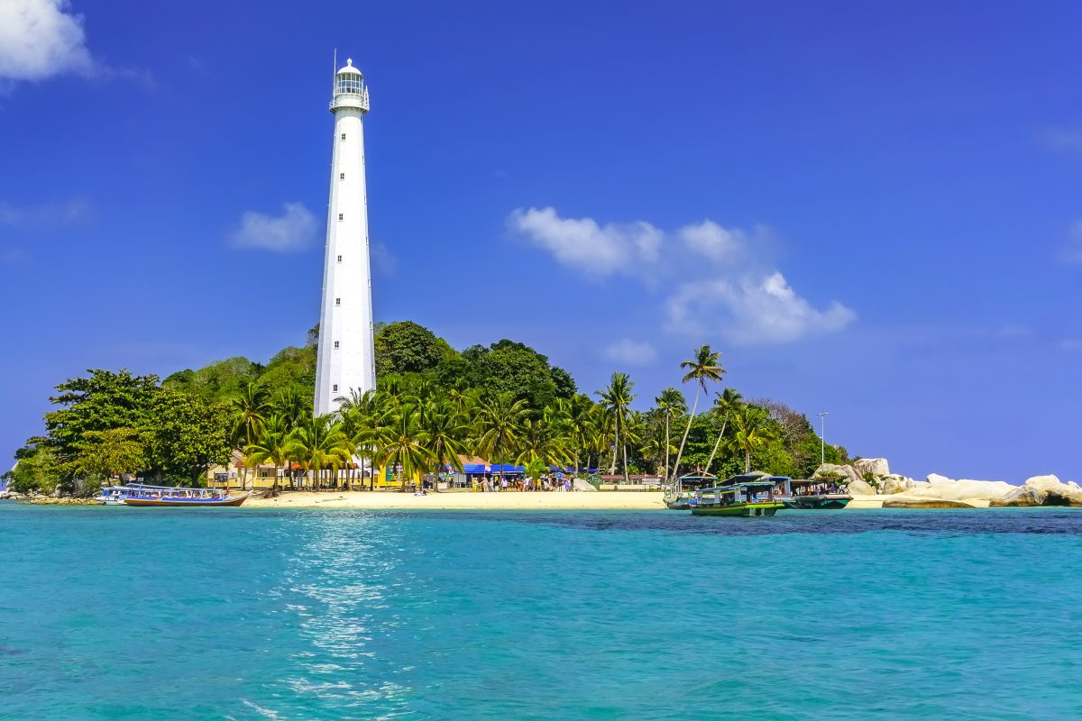 View of Lengkuas Island with white lighthouse in Belitung Indonesia