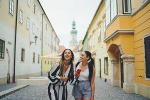 Female tourists are exploring Sopron Hungary old town