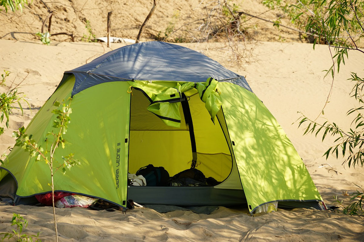 a beach tent with privacy zip lining