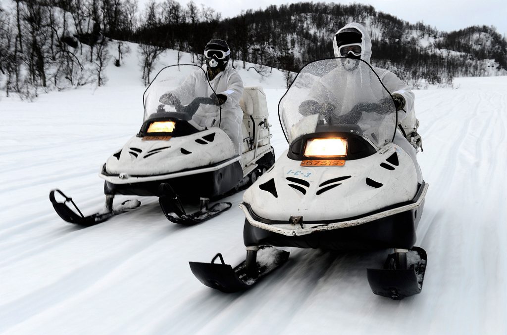 Snowmobiling on solid ice lake