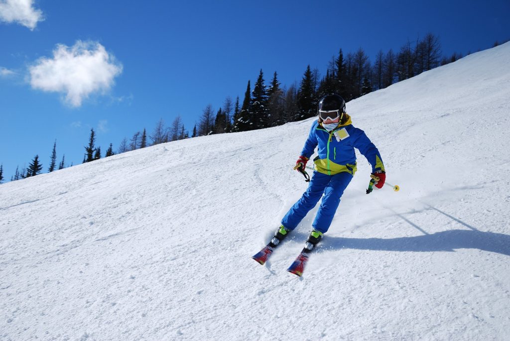 Skiing down the powdery snow ski slopes in West Virginia Ski resort
