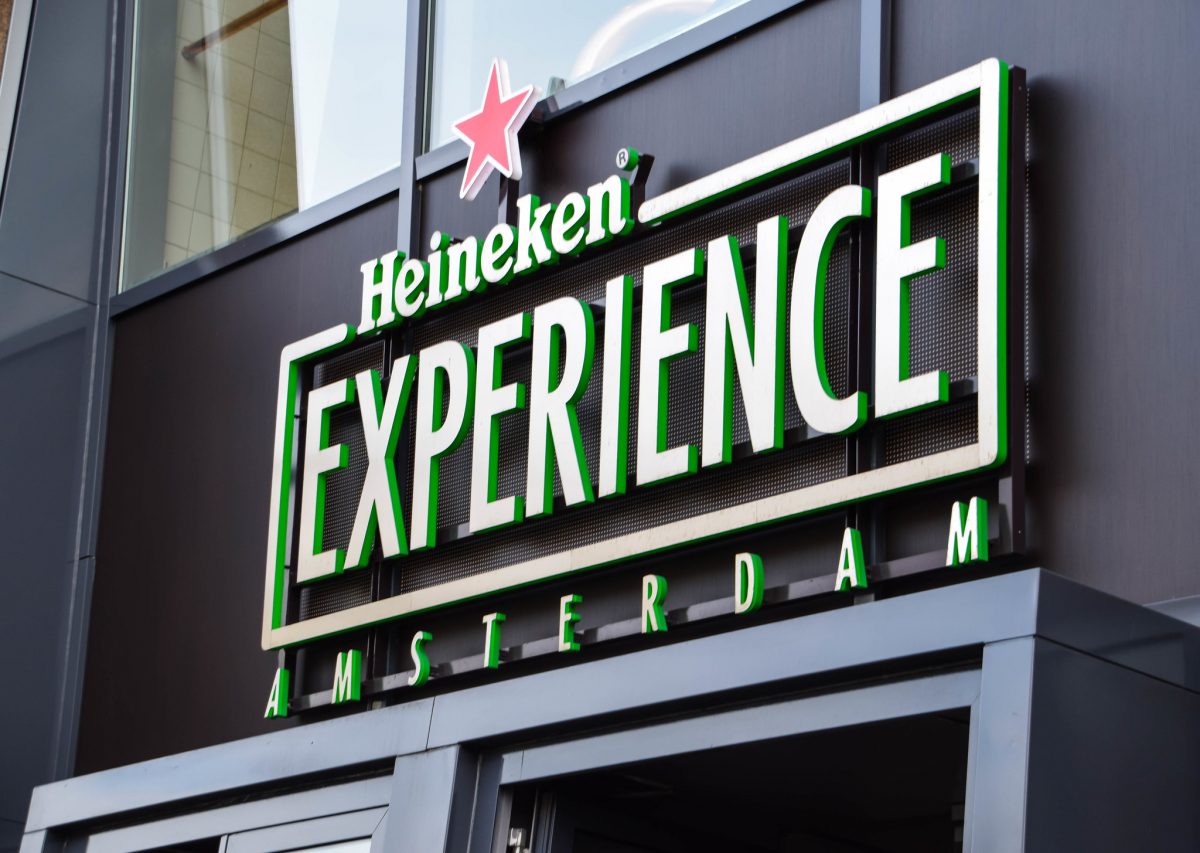 Close up shot of Amsterdam's Heineken Experience building logo Close up shot of Amsterdam's Heineken Experience building logo