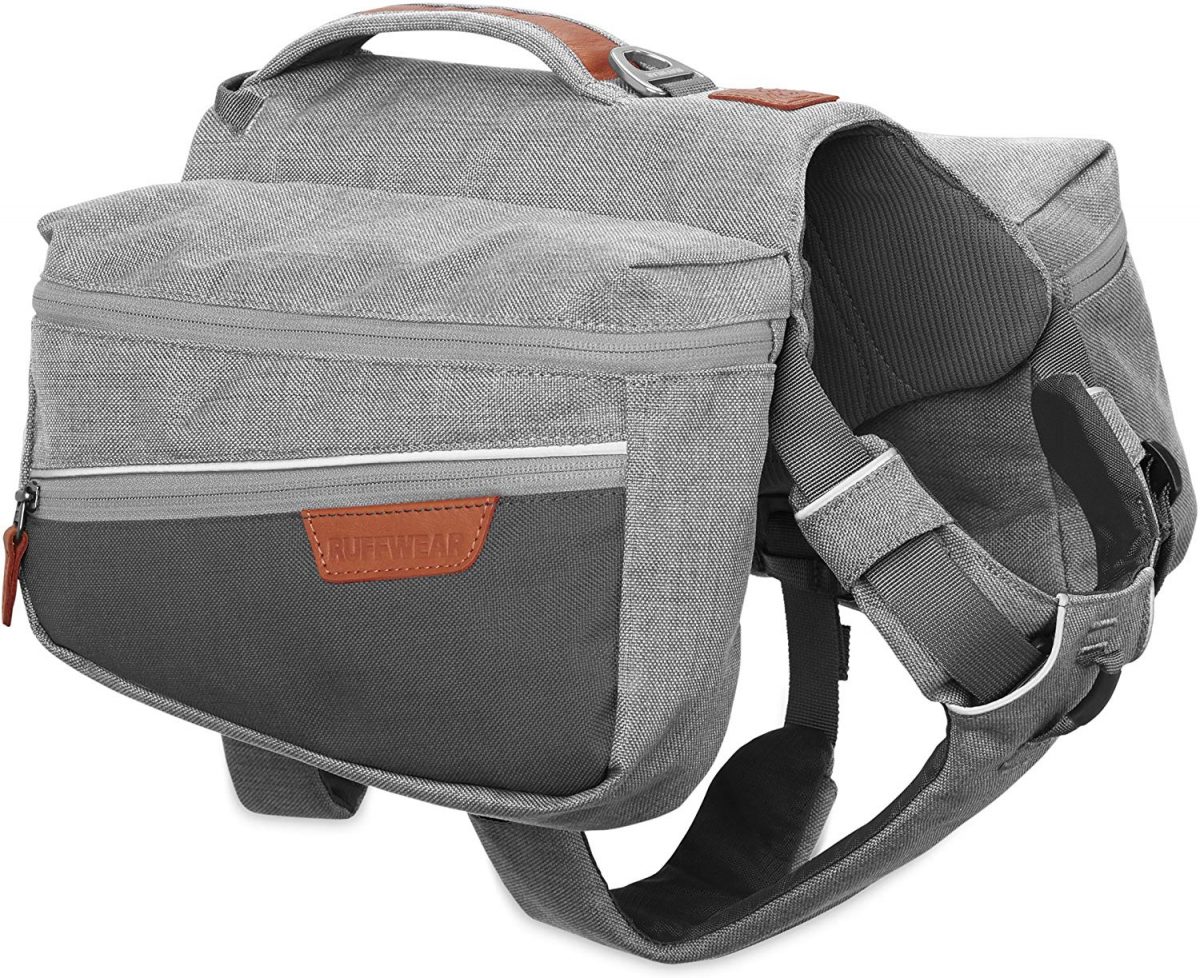 Photo of the grey saddle bag dog backpack with brown accents and a white background Photo of the grey saddle bag dog backpack with brown accents and a white background