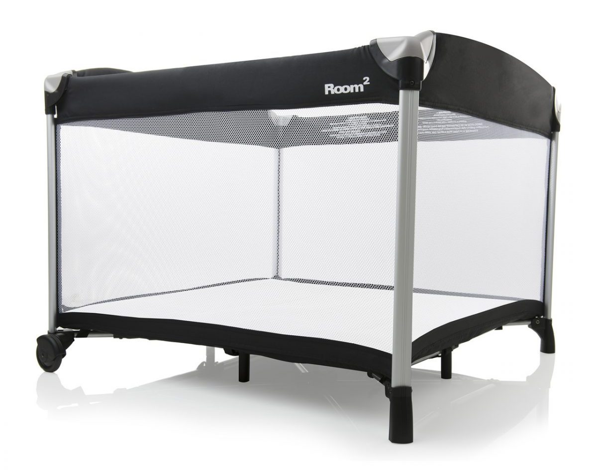 Joovy New Room2 Portable Playard rectangular crib on wheels with semi-opaque walls and black accents. Joovy New Room2 Portable Playard rectangular crib on wheels with semi-opaque walls and black accents.