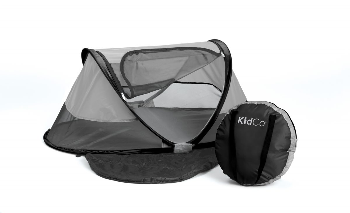 Peapod Plus infant travel bed with tent-like meshes and zippered openings Peapod Plus infant travel bed with tent-like meshes and zippered openings