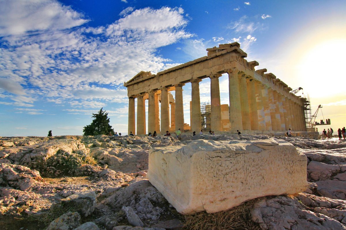 Tourists gather around the Parthenon in Athens, Greece