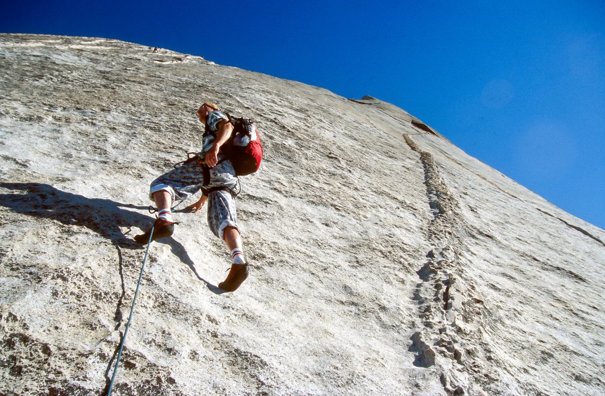 Man Climbing a Rock at Yosemite National Park
