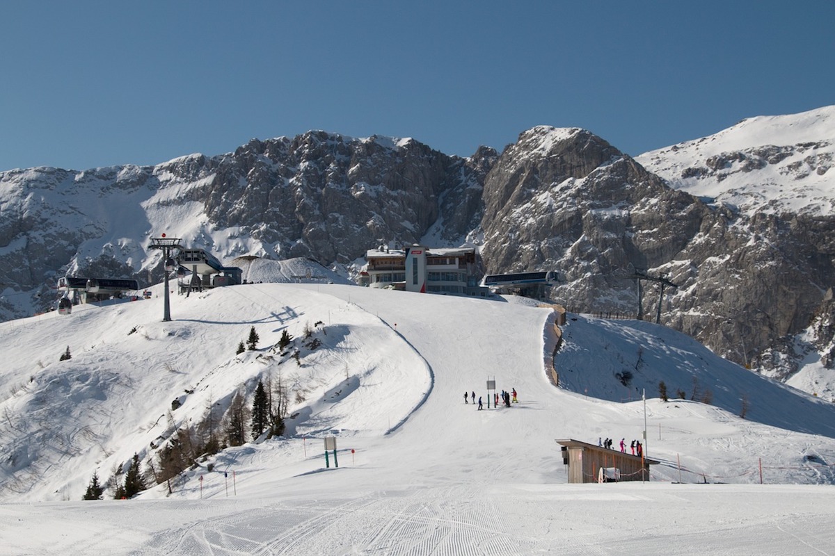 People skiing on the snowy alps of Nassfeld, Austria
