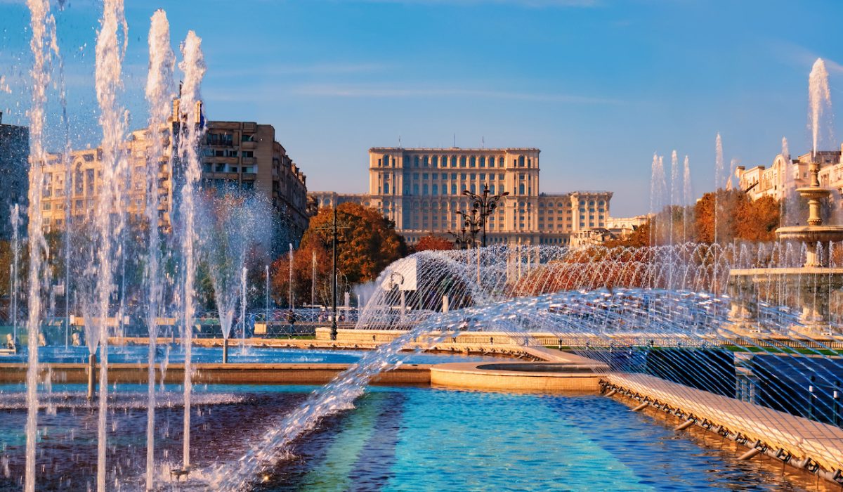 Famous building of Parliament house in Bucharest, the bigest landmark of Romania near the new fountains of Bucharest capital.