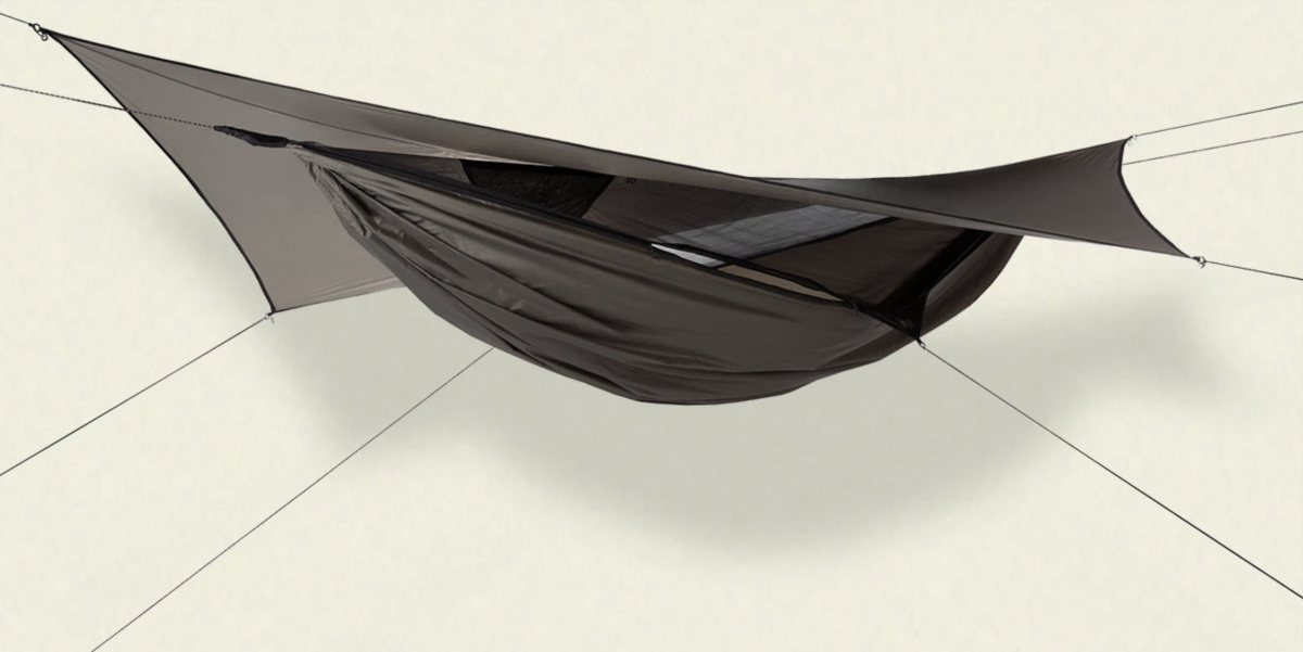 Image of the Hennessy Hammock Ultraite Zip set up against cream backdrop