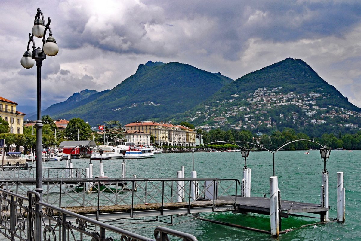 Lugano Switzerland wide angle shot of the mountains and lake at Lugano Switzerland