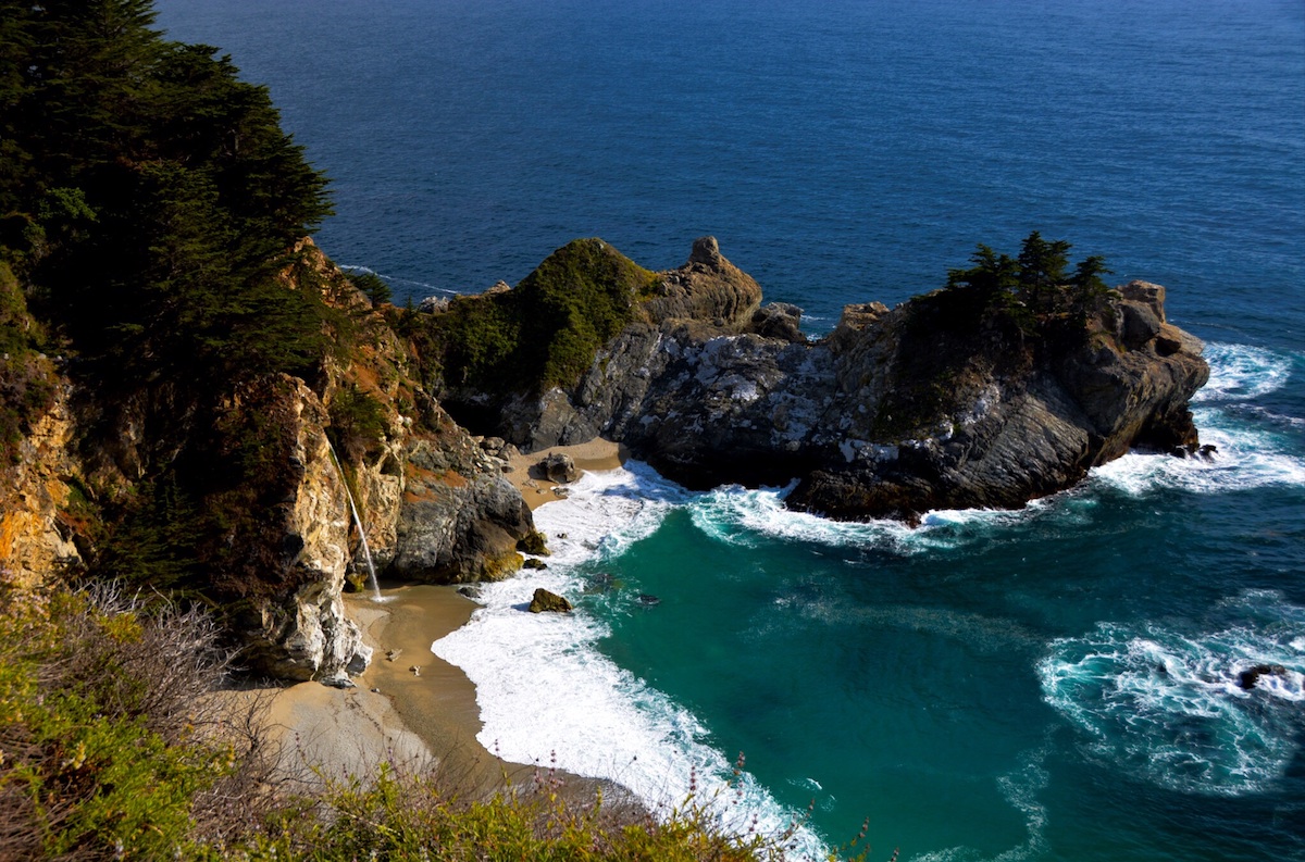 Beach waves on the rocky shore of Big Sur State Park