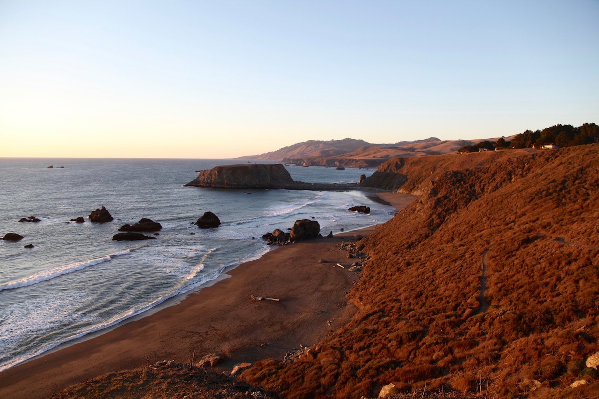 The long sandy beach and rugged headlands of Sonoma Coast State Park