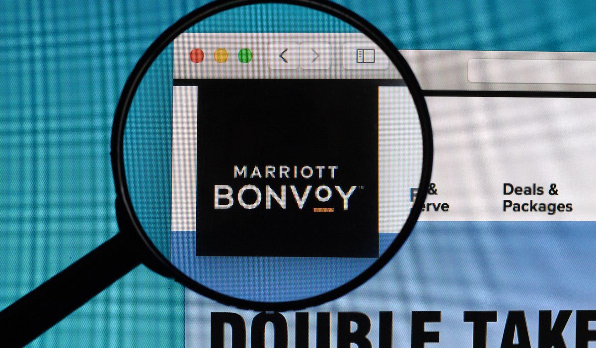 Marriott Bonvoy logo under magnifying glass Marriott Bonvoy logo under magnifying glass