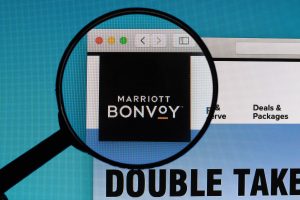 Marriott Bonvoy logo under magnifying glass