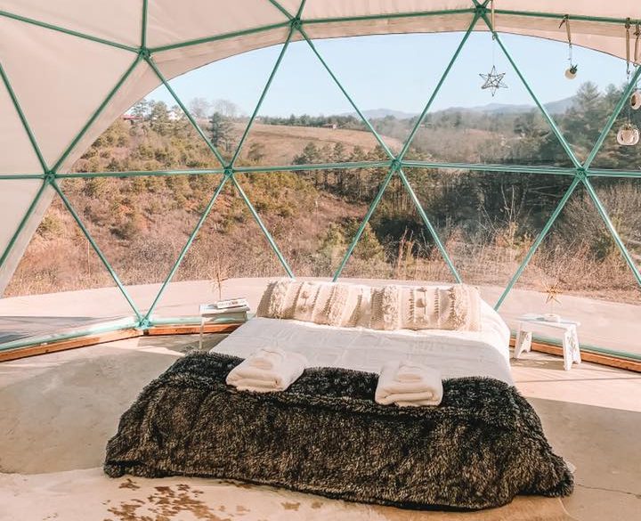 Mattress set under the clear glamping dome