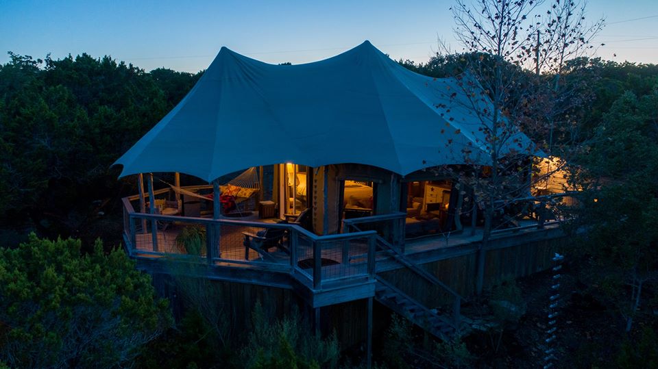 Sinya's famous glamping lodge lit up at night