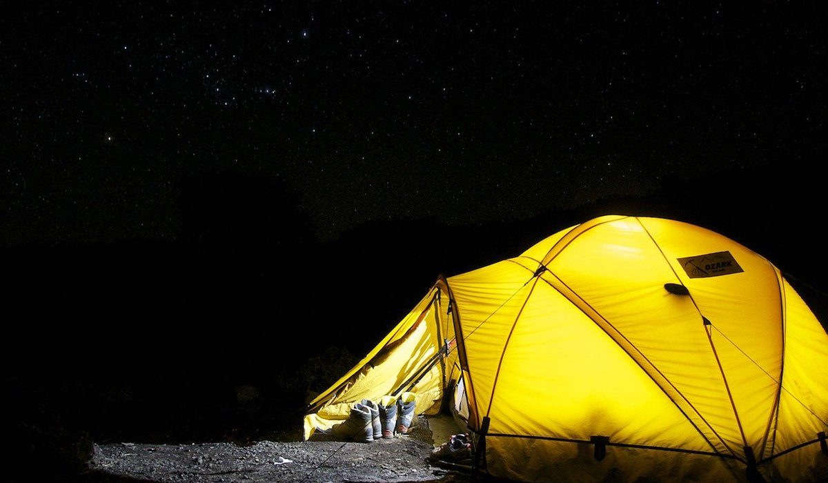 A single dome tent on a starry night camping A single dome tent on a starry night camping
