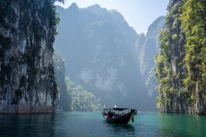 Photo of boat among Thailand's famous limestone formations