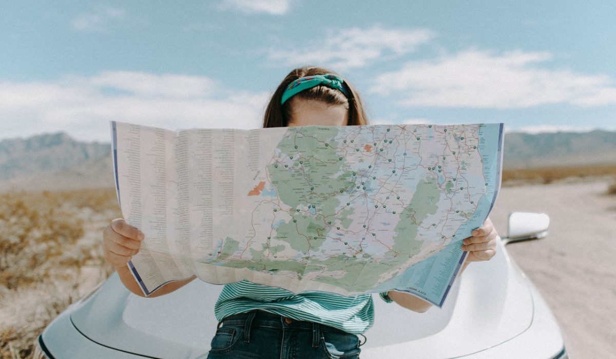 A girl looking at the map a girl looking at the map
