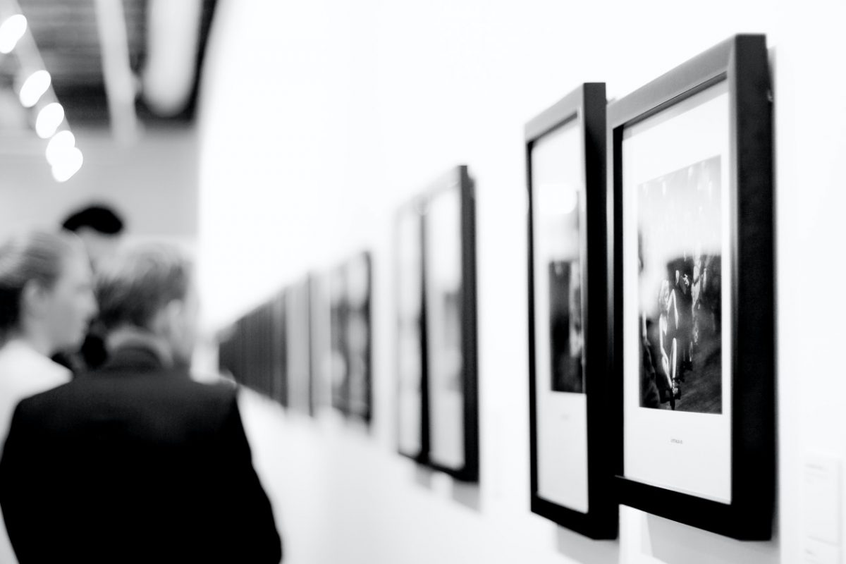 framed paintings hanging on the wall